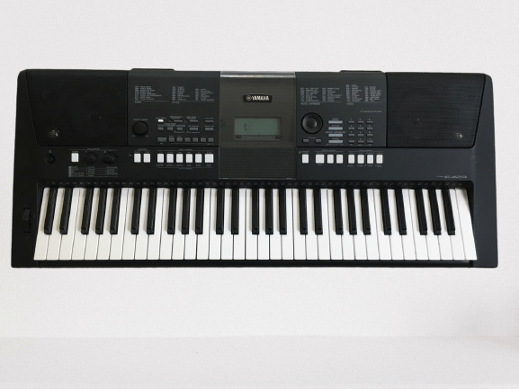The Yamaha PSR-E423 is a portable arranger keyboard with 61 touch-sensitive keys. It features a wide range of voices, styles, and effects, making it a versatile and powerful instrument for musicians of all levels.